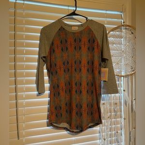 Brand new LulaRoe XS shirt.